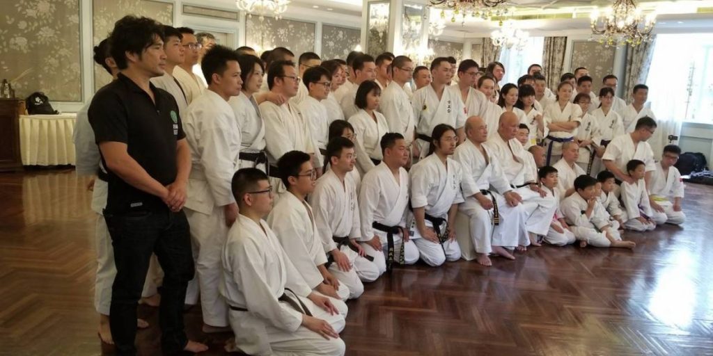 Shanghai Okinawa karate seminar group in a dojo