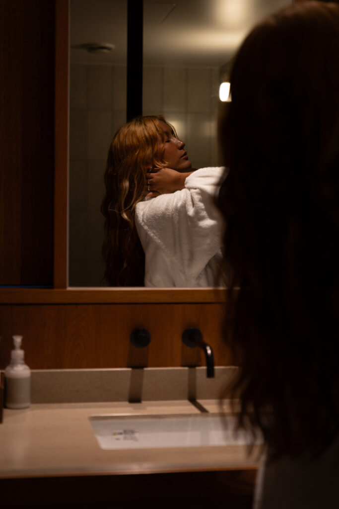 Guest in a karate gi getting ready in a private dressing room