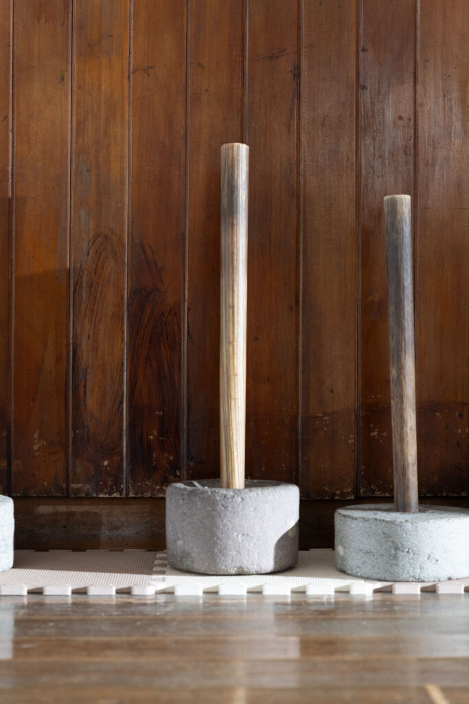 Traditional makiwara striking posts in a wooden dojo
