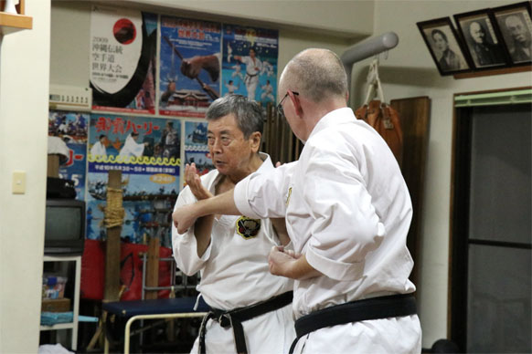 Yoshitaka Taira Sensei demonstrating a technique with a student