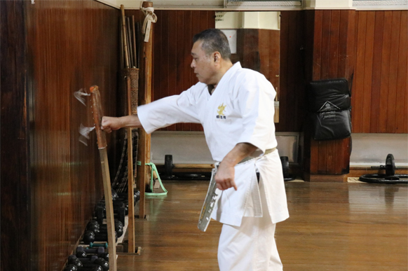 Tetsu Gima Sensei training at a makiwara in the Jundokan
