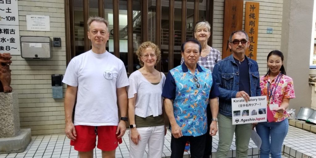 Goju-ryu history tour group outside a dojo in Okinawa
