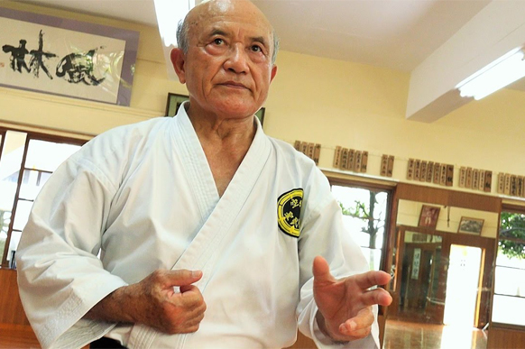 Zenpo Shimabukuro Sensei of the Seibukan in his dojo